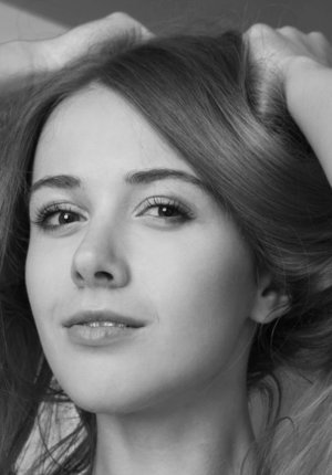 18 year old girl Agnes uncovers her perky tits as she gets completely naked